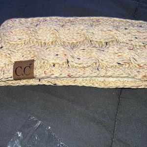Brand new never worn ear muffin head wrap with fuzzy lining  on inside